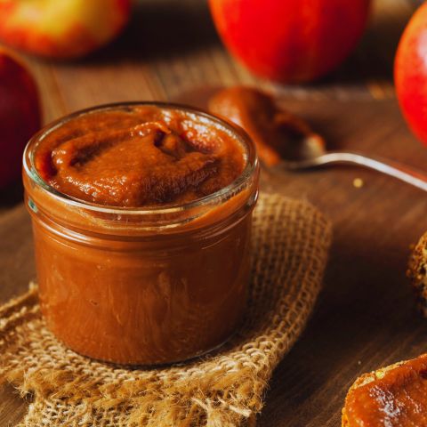 Apple Butter with surrounding apples