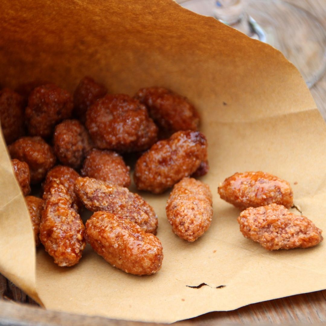 honey roasted peanuts in a paper bag