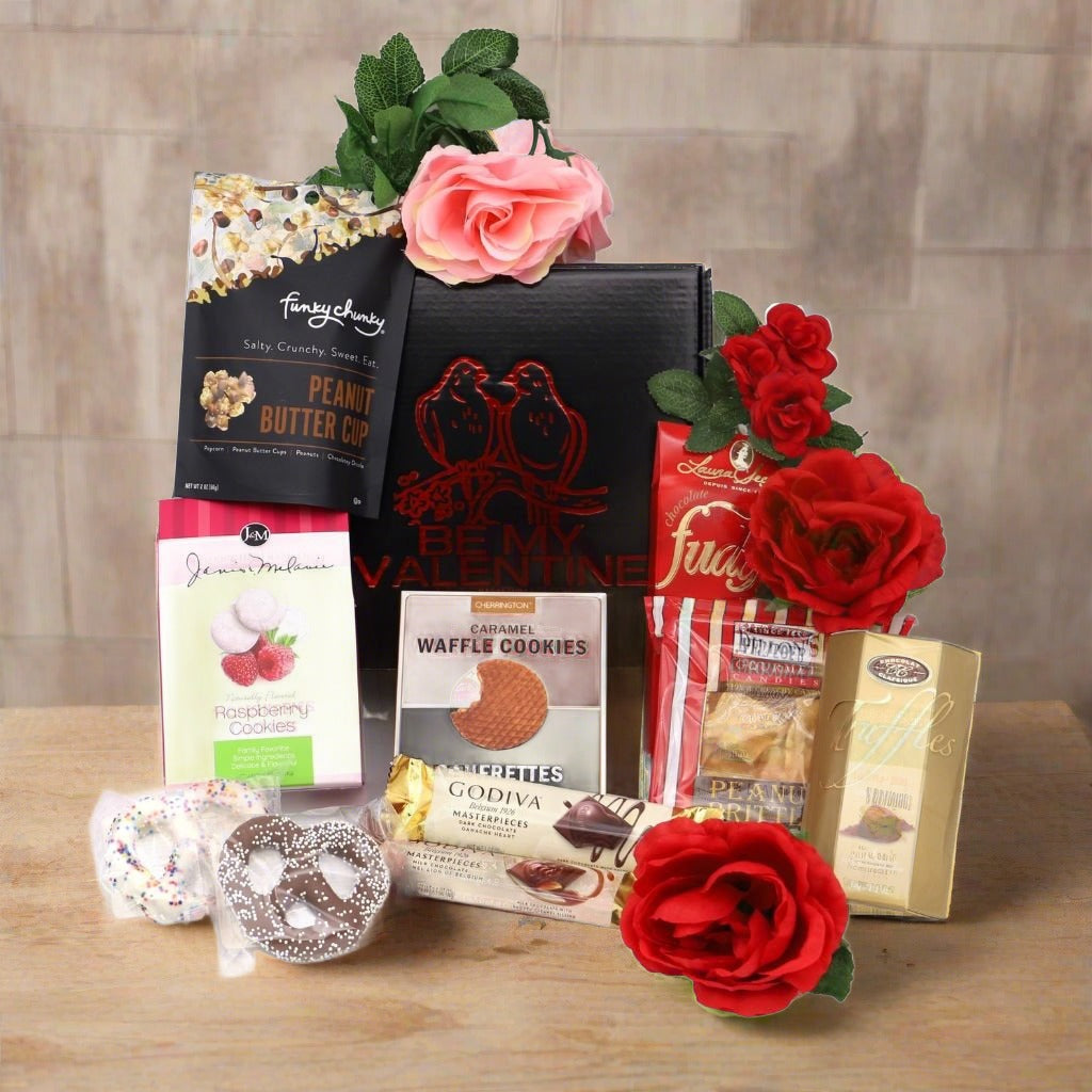 Assorted sweets and fudge in a love-themed gift box for romantic celebrations.