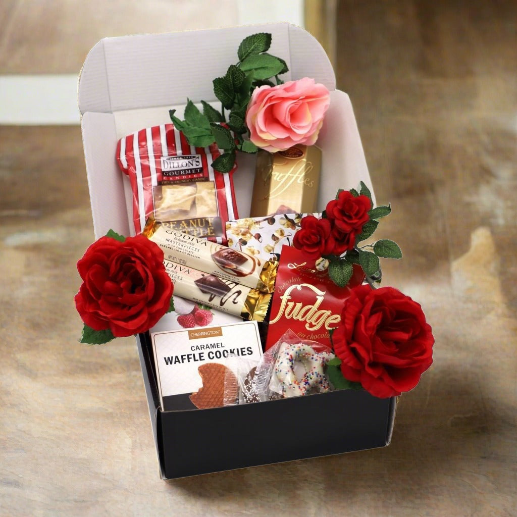 Elegant gift box featuring pretzels, truffles, and other treats for special occasions.